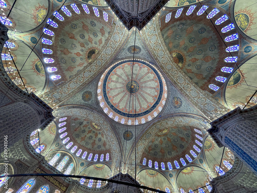 ceiling of the blue mosque in istanbul, with its colorful stained glass windows, impressive ceiling with its central vault and large pillars, Sultan Ahmed Mosque, ka © Javier