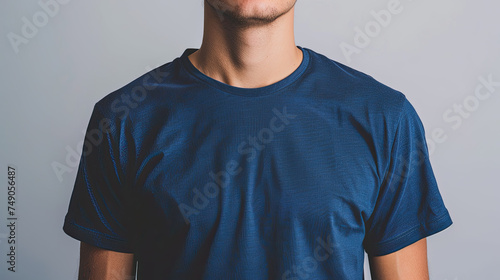 Photo of a man wearing blank navy blue t-shirt mockup,  navy bluet shir t for designs or prints , ai generative, tshirt for design mockups photo