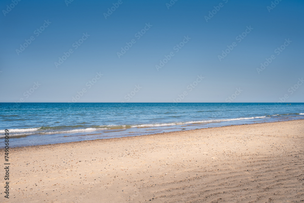 Happisburgh sandy beach on a sunny spring day, Norfolk, England; can be used as a bakground