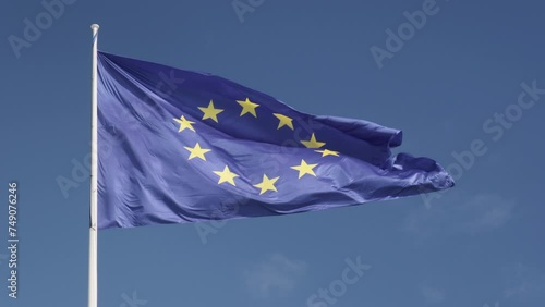 European Union flag waving with sky in background photo