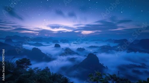 Night view of Phu Langka, Thailand, backdrop of the star tails. Naga shaped clouds © 2D_Jungle