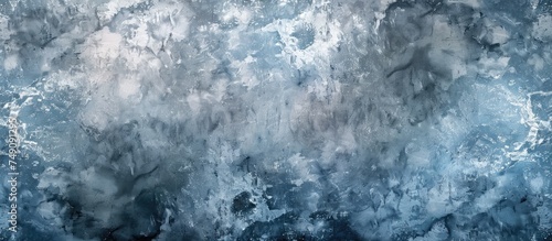 A grunge grey background highlighted by a vibrant mix of blue and white water elements. The water appears to be flowing, creating a dynamic and refreshing visual contrast.