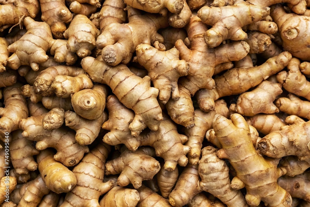 Close-up texture of fresh ginger roots - perfect for food backgrounds, recipes, and natural designs Close-up texture of fresh ginger roots - perfect for food backgrounds, recipes, and natural designs