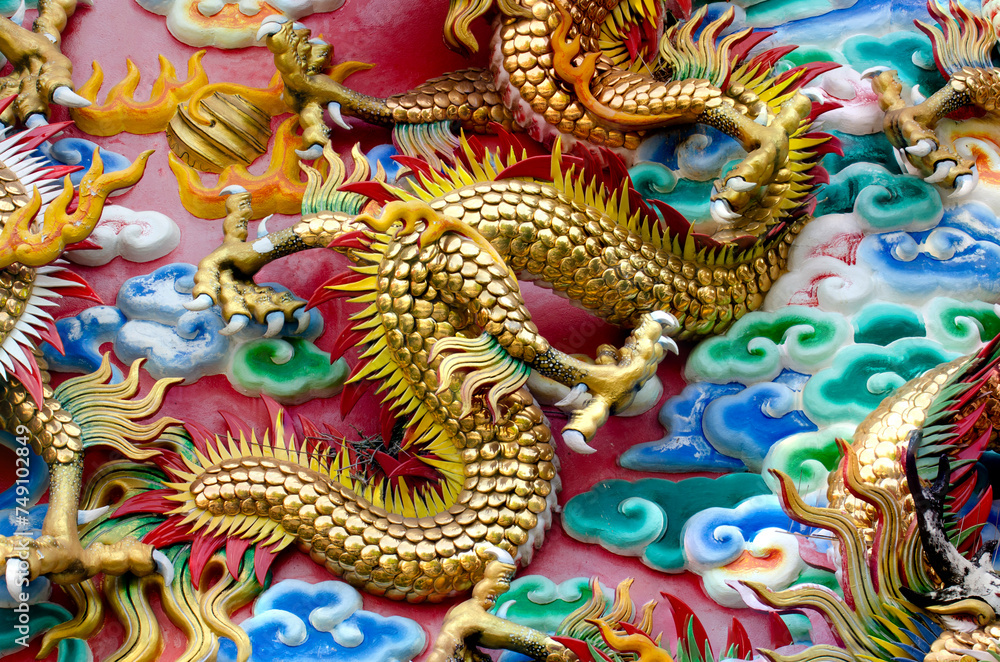 Dragon, head sculpture on wall of temple in Thailand, Symbol of wealth, prosperity. Dragon, head sculpture on wall of temple in Thailand, Symbol of wealth, prosperity.