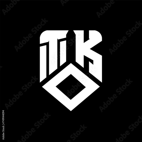 TOK letter logo design on black background. TOK creative initials letter logo concept. TOK letter design.
