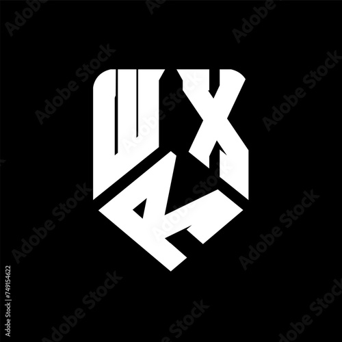 WRX letter logo design on black background. WRX creative initials letter logo concept. WRX letter design.
 photo