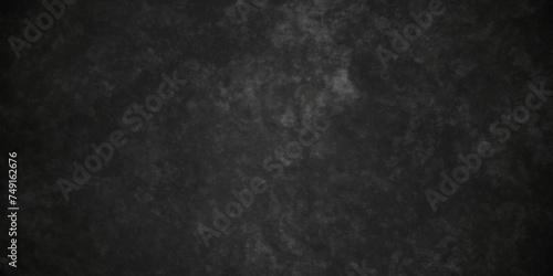 Textured dark black grunge background, old grunge background. Chalk board and Black board grunge backdrop background. Abstract black distressed Rough texture grunge concrete background. 