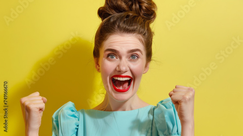 A jubilant individual with a beaming smile and clenched fists exudes excitement and joy, set against a vibrant yellow background.