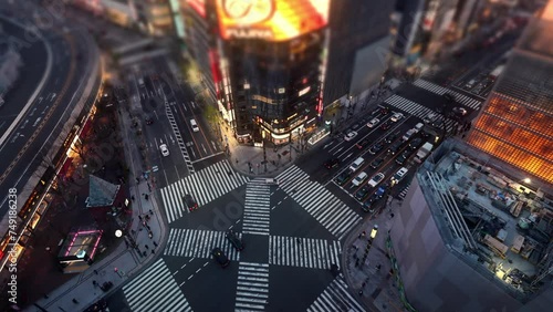 city crossroads aerial view, time lapse of busy intersection with pedestrian crossing and cars in Tokyo, Shibuya Crossing, city life, crowded city road photo