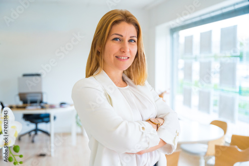 Real estate agent looking at camera confident