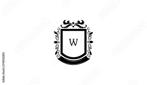 Illustration of a Shield With Crown Alphabetical Logo