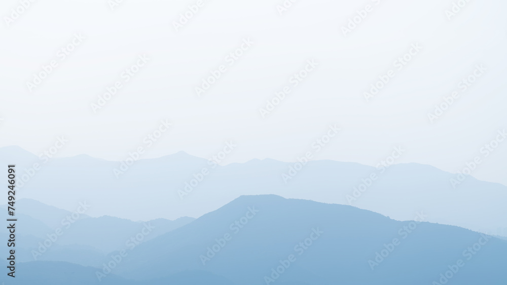 Landscape of mountain range with fog in morning. Natural background.