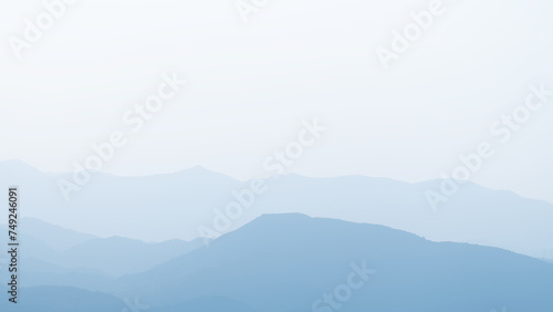 Landscape of mountain range with fog in morning. Natural background.