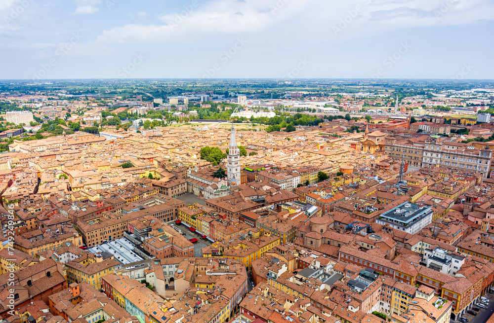 Modena, Italy. Historical bell tower. Torre Civica - Ghirlandina. Panorama of the city on a summer day. Sunny weather