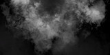 white smoke isolated on black background. Beautiful storm cloud isolated on black background. Smoke from cigarettes. white cloud and black sky textured background smoky effect for photos and artworks.