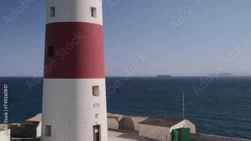 Europa Point Lighthouse at the Europa Point in Gibraltar with the Gibraltar strait in background
