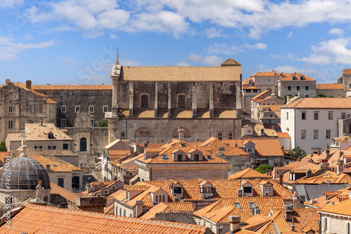 Aerial view of Old Town from medieval City Walls by Adriatic Sea. Church of St. Ignatius in a dinstance, Dubrovnik, Croatia photo