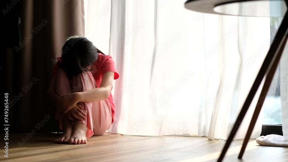 The child is crying, Unhappy child sitting on the floor
The child is crying, Unhappy child sitting on the floor