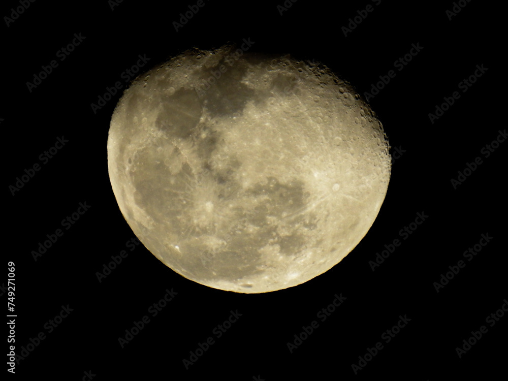 a full moon with a black background in the night sky a full moon with a black background in the night sky