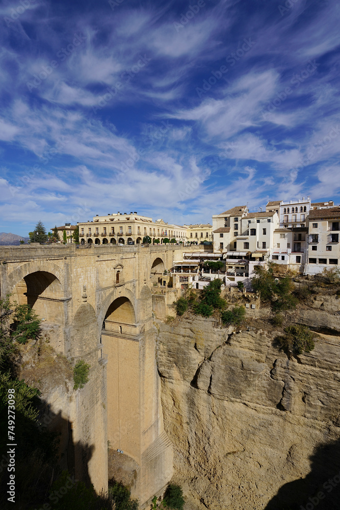 ancient bridge in Ronda with blue sky