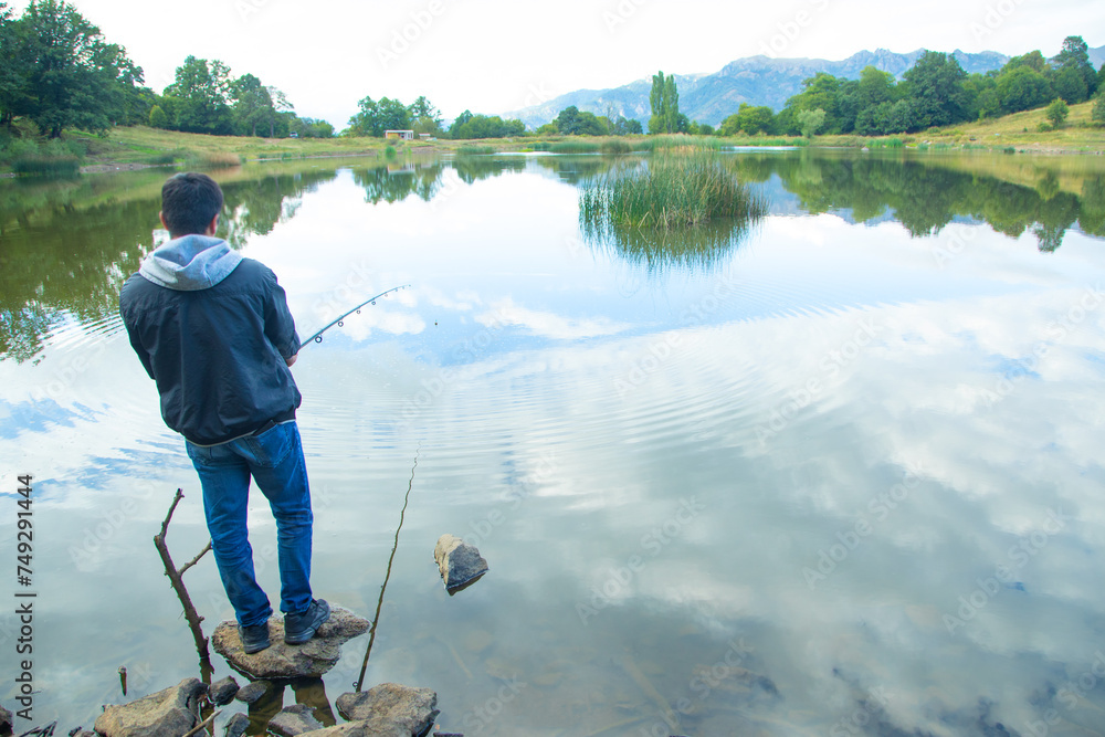 Fisherman catches fish. Fishing. Hobby Fisherman catches fish. Fishing. Hobby
