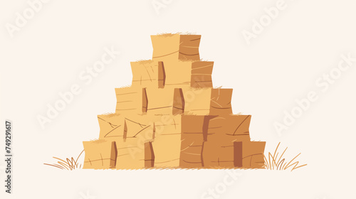 Hay bales stacked in a pyramid on an isolated background photo