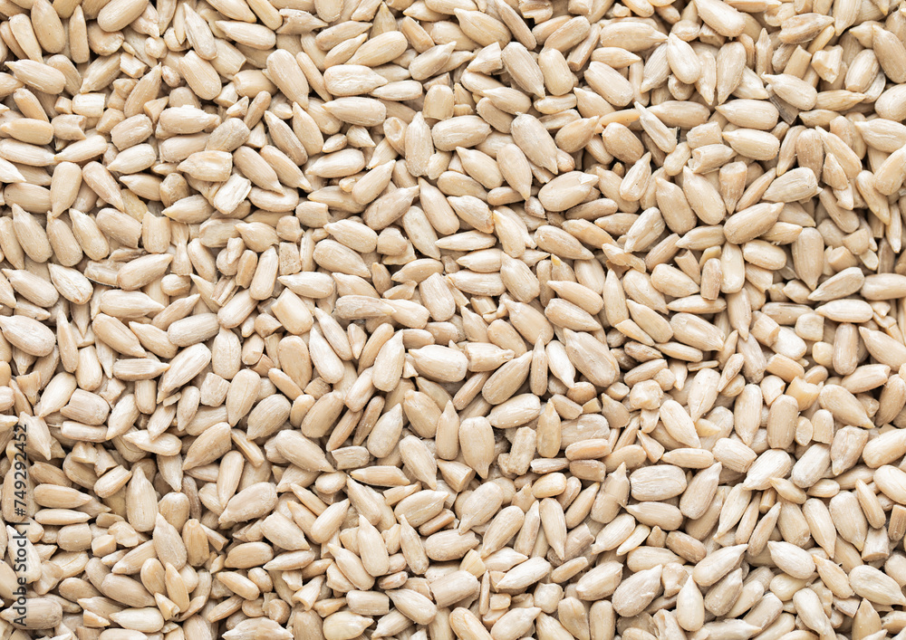 Healthy peeled sunflower seeds top view macro background.Healthy snack. Healthy peeled sunflower seeds top view macro background.Healthy snack.