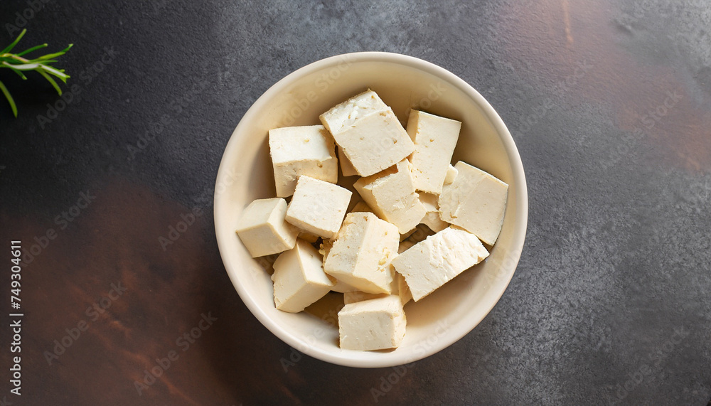 Bowl of raw tofu cubes. Copy space. Menu page top view food background concept Bowl of raw tofu cubes. Copy space. Menu page top view food background concept