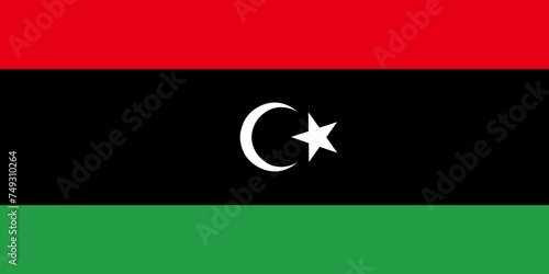 Close-up of vector graphic of red, black and green national flag of African country of Libya with white star and crescent moon. Illustration made February 8th, 2024, Zurich, Switzerland.