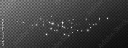 Golden sparks and stars glitter with a special light effect. Vector sparkles on a transparent background create a Christmas abstract. Vector sparkles on a transparent background create a Christmas abs