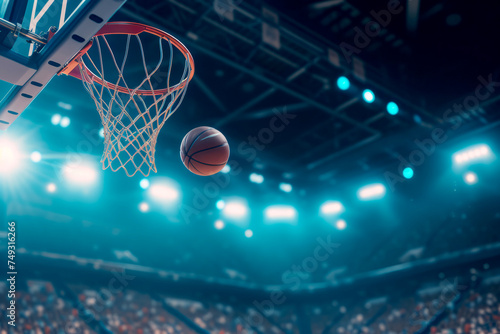 Basketball background. basketball ball flying into the basket with bright blue lights in the background with space for text or inscriptions
 photo