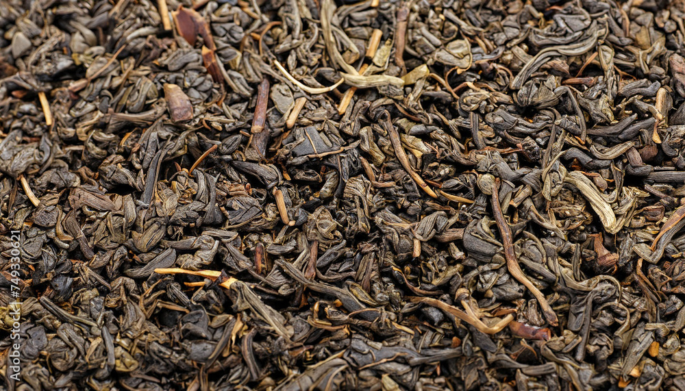Chinese Pu Ehr dried tea leaves close up full frame as background Chinese Pu Ehr dried tea leaves close up full frame as background