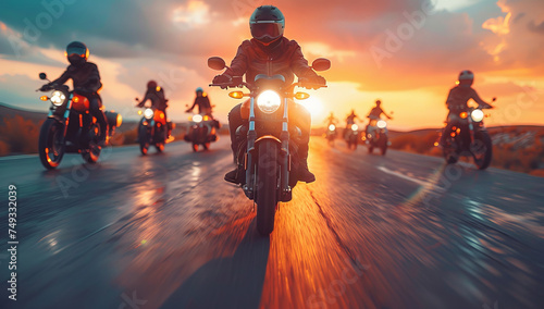Motorcyclists riding on the road at sunset. Biker on a motorcycle. © Meow Creations
