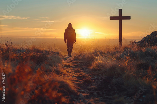 Pilgrim Walking Towards Sunrise by Cross on Hill