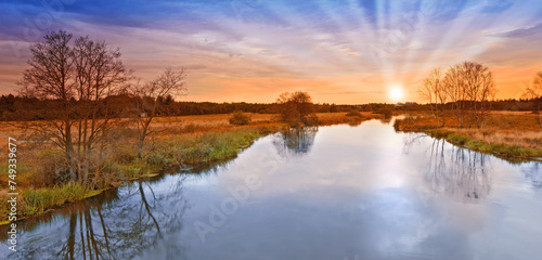 River, farm and sunset or nature landscape in summer environment in England countryside, travel or horizon. Water, agriculture and panorama of filed meadow or clean energy or dusk sky, growth or lawn