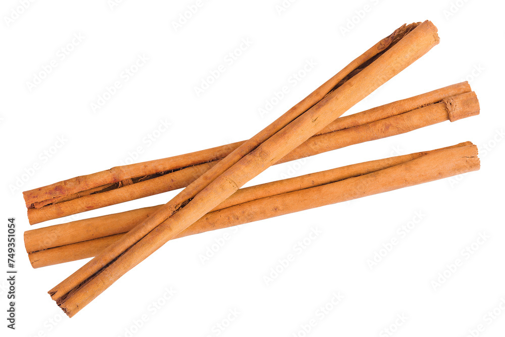 Cinnamon sticks with powder in wooden spoon isolated on white background with full depth of field. Top view. Flat lay.