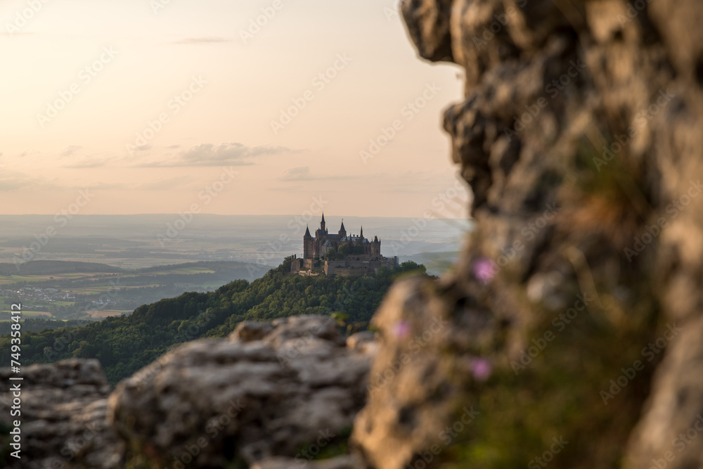 Hohenzollern Castle at sunset with rocks in the foreground | Series portrait and landscape format, foreground or background blurred