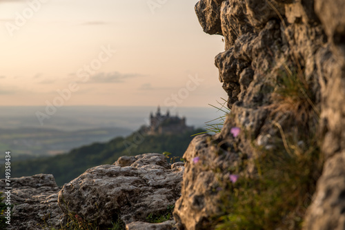 Hohenzollern Castle at sunset with rocks in the foreground | Series portrait and landscape format, foreground or background blurred photo