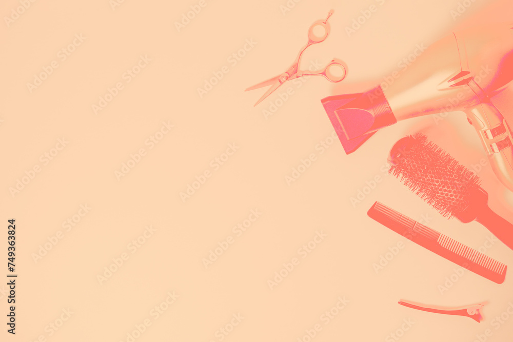 Hairdresser tools with copy space in peach fuzz color. Hairdresser tools with copy space in peach fuzz color.