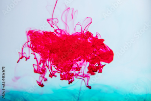 This photograph was created by dropping paint into water. before disintegrating into strange, beautiful shapes © Noppadol