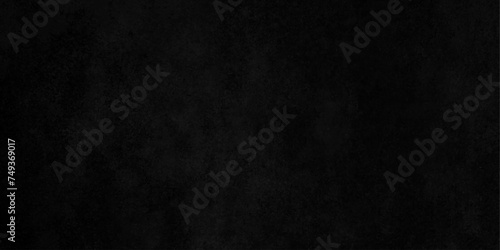 Black noisy surface,dust particle paint stains.brushed plaster.asphalt texture,with grainy rustic concept close up of texture background painted abstract surface ancient wall. 