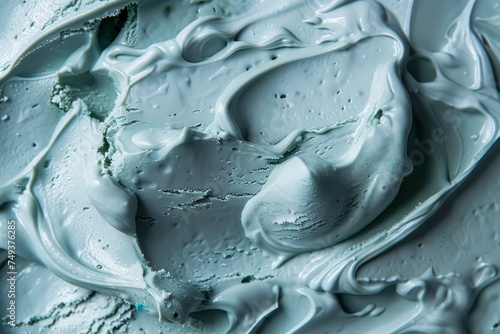  A detailed close-up texture of vibrant blue matcha ice cream, showcasing its creamy consistency