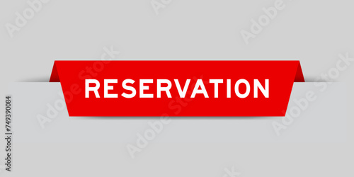 Red color inserted label with word reservation on gray background