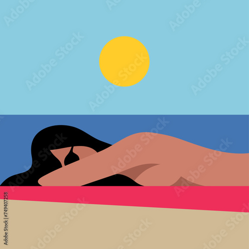 Woman is sunbathing on the beach