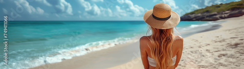 Stunning young woman on a perfect beach day, sand and sea in harmony, summer bliss