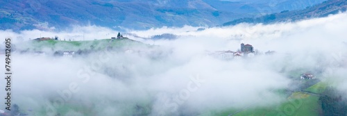 Aerial drone view of the winter landscape around the town of Gainza and Amezqueta and the Txindoki Mountain. Aralar Mountain Range. Goierri region. Gipuzkoa. Basque Country. Spain. Europe photo