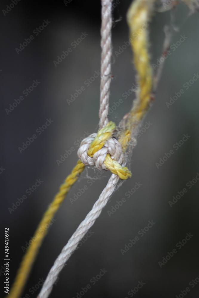 yellow rope hanging on the wall yellow rope hanging on the wall