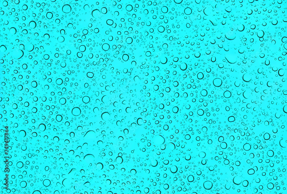 Water droplets on transparent turquoise background