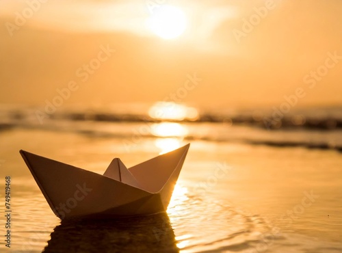 Paper boat floating on the ocean
