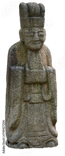 A stone statue standing near a tomb in Korea